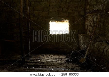 Old Rustic Clay Cowshed Interior With Window
