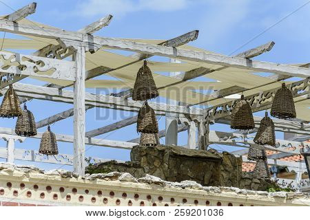 Old Bee Skeps Suspended On Wood Poles.ancient Bee Hives