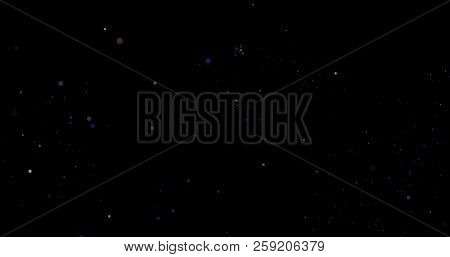 Flying Dust Particles On A Black Background
