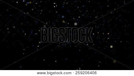 Flying Dust Particles On A Black Background