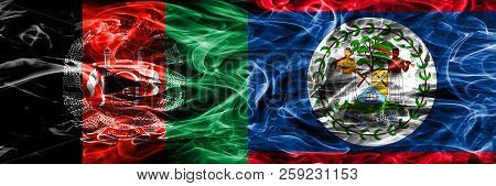 Afghanistan Vs Belize Smoke Flags Placed Side By Side. Thick Colored Silky Smoke Flags Of Afghani An