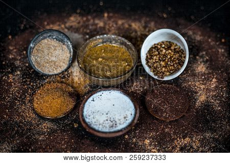 Close Up Of Face Pack Of Mung Bean Or Green Gram On Wooden Surface With Sandalwood Powder,milk,green