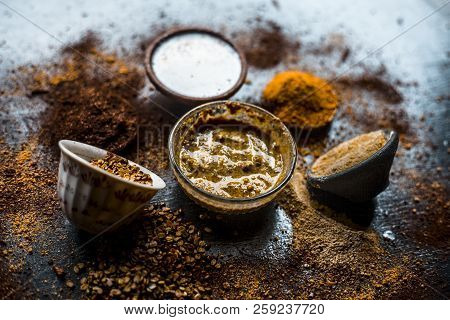 Close Up Of Mung Dal Face Pack With Aloe Vera,sandalwood,milk, And With Green Grams On Wooden Surfac