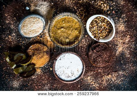 Close Up Of Mung Dal Face Pack With Aloe Vera,sandalwood,milk, And With Green Grams On Wooden Surfac