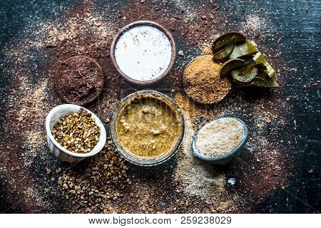 Close Up Of Mung Dal Face Pack With Aloe Vera,sandalwood,milk, And With Green Grams On Wooden Surfac