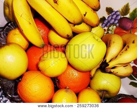 Bodegon Of Oranges, Apples, Bananas And Lemons