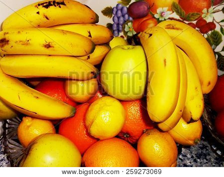 Bodegon Of Oranges, Apples, Bananas And Lemons