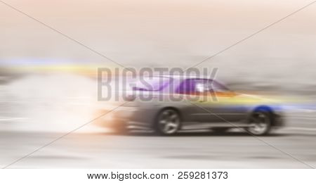 Blur Image Of Driving A Drift Car By A Skilled Driver And Having Experience On A Speed Track