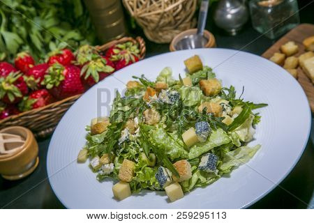 Healthy Salad Made From Green Salad Leaves, Rocket Salad, Slices Of Fresh Pears, Pieces Of Blue Chee