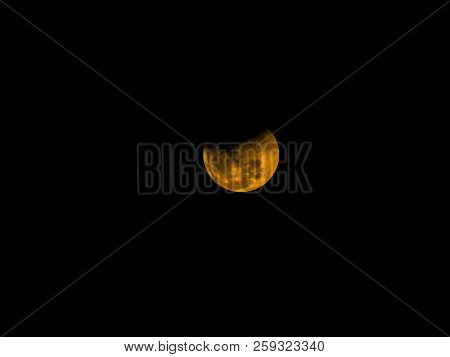 Yellow Moon Or Supermoon Or Newmoon Or Fullmoon In The Dark Sky During Night Time With Full Of Cloud