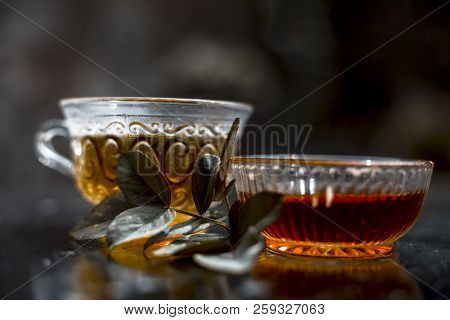 Close Up Of Ingredients Of Green Tea I.e. Honey,sugar And Green Tea Bags On Wooden Surface With Some