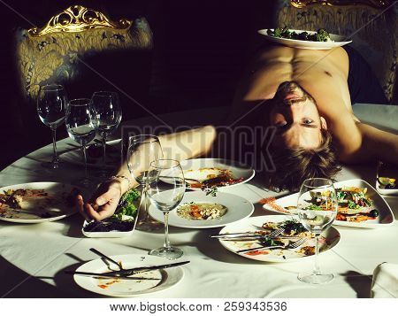 Handsome Man Or Sexy Muscular Macho Athlete Bodybuilder With Muscle Torso Undressed To Waist Lying O