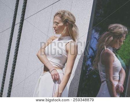 Fashionable Woman In City