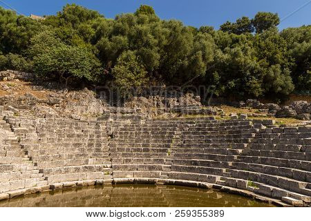 Butrint, Albania- 29 June 2014: Ruins Of Theater Of Buthrotum, Ancient Greek And Later Roman City An