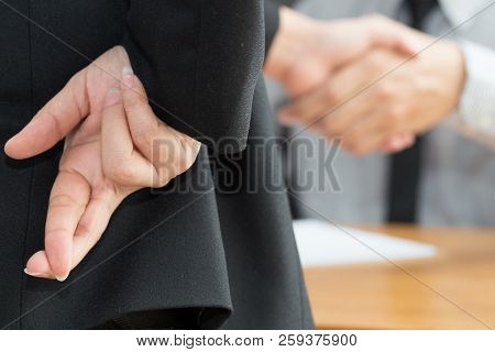 Dishonesty, Business Fraud Concept, Businessman Showing Fingers Crossed