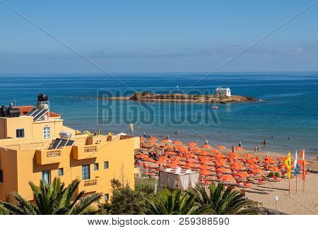 Malia. Crete, Greece - July 1, 2018: Sunbeds At The Beach In Malia On Crete, Greece