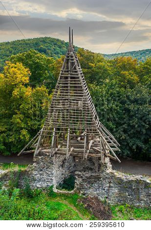 Tower Of Nevitsky Castle, View From Above. Forest And Mountains In The Distance