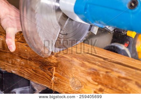 Close Up From A Buzz Saw Cuts A Wood