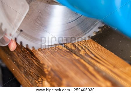 Close Up From A Buzz Saw Cuts A Wood