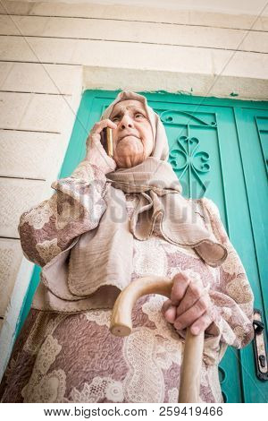 Happy senior Muslim woman