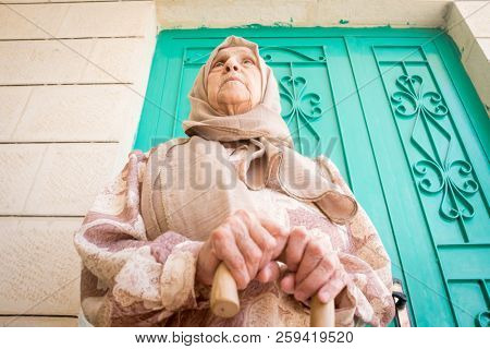 Happy senior Muslim woman