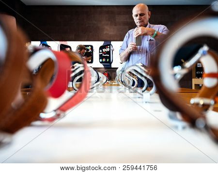 Strasbourg, France - Sep 21, 2018: Apple Store With Senior Male Customer Admiring The New Latest Wat