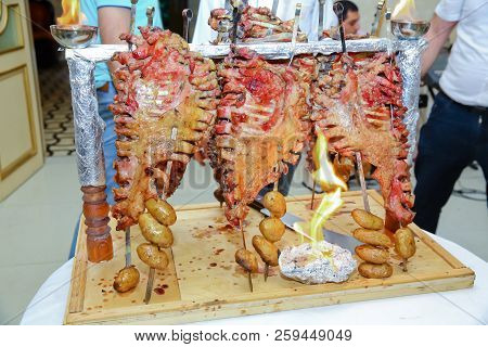 Roasted Meat Over An Open Fire, Cooked In A Special Way.barbecue Is Prepared Of Lamb Or Sheep Meat A