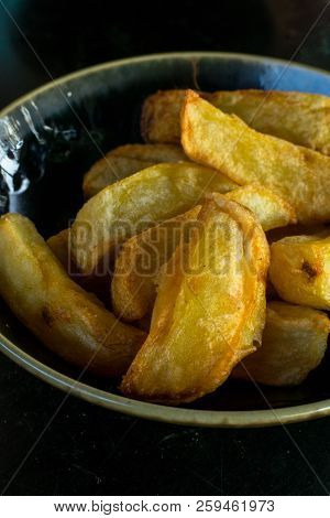 Deicious Baked Potato. Fried Crust, Close Up, Selective Focus