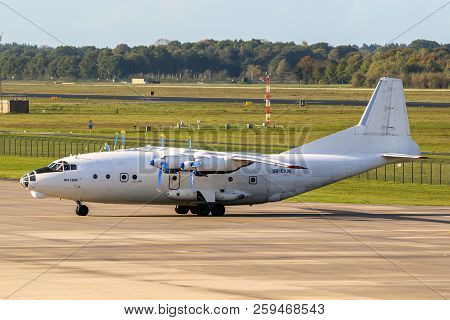 Eindhoven, The Netherlands - Oct 27, 2017: White Russian Antonov An-12 Cargo Plane Taxiing On Eindho