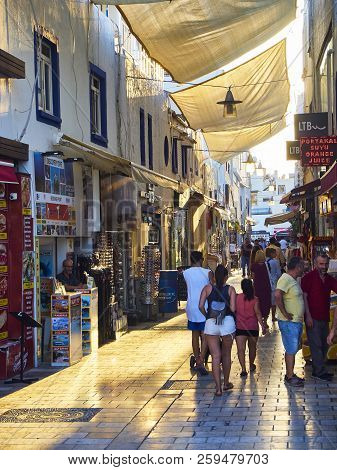 Bodrum, Turkey - July 5, 2018. Tourists Walking On The Streets Of Bodrum Downtown Bazaar. Mugla Prov