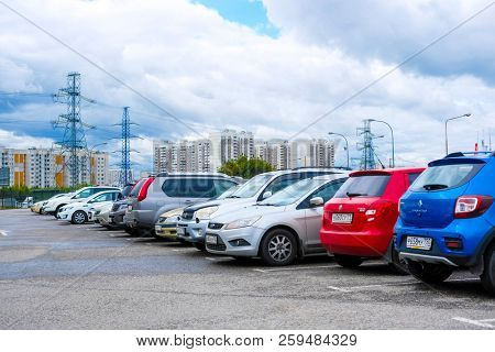 Moscow, Russia - September, 20, 2018: Cars on a parking on a park-and-ride parking near Annino metro station in Moscow, Russia