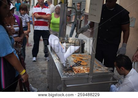 Havana, Cuba - November 3, 2012: Cooking Churros, Spanish Dessert, Street Food