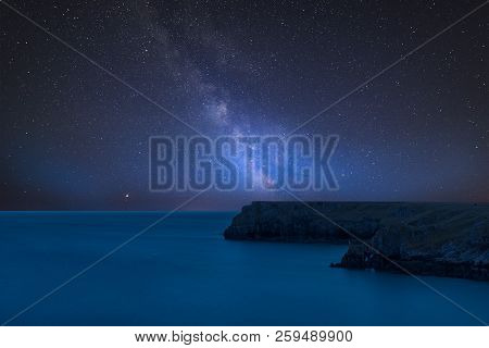 Stunning Vibrant Milky Way Composite Image Over Landscape Of Barafundle Bay On Pembrokeshire Coast I