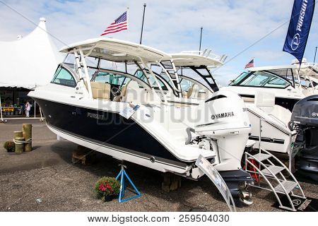 NORWALK, CT, USA-SEPTEMBER 20, 2018: Pursuit DC 235 displayed on  Progressive Norwalk Boat Show 2018.