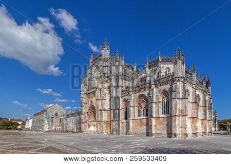 Batalha, Portugal. Monastery of Batalha aka Santa Maria da Vitoria Abbey. Facade with Portal in Gothic and Manuelino aka Manueline style