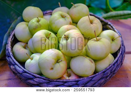 Ripe Of Green Apples In The Basket On Farmer Market.