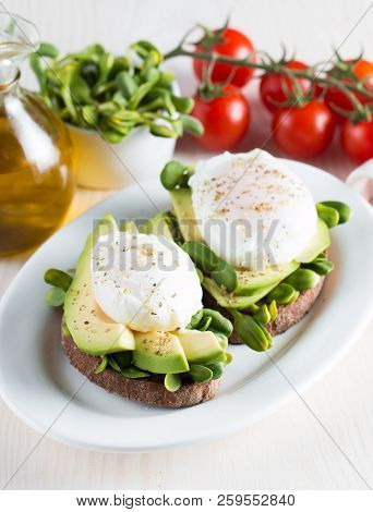 Avocado Toast, Cherry Tomato On Wooden Background. Breakfast With Toast Avocado, Vegetarian Food, He