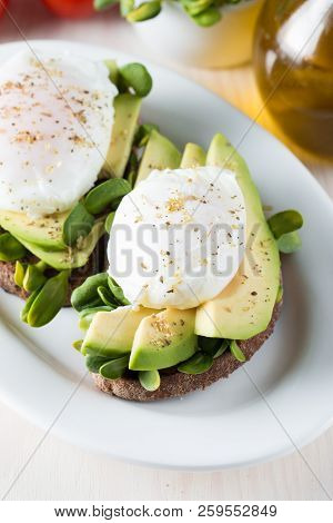Avocado Toast, Cherry Tomato On Wooden Background. Breakfast With Toast Avocado, Vegetarian Food, He