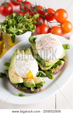 Avocado Toast, Cherry Tomato On Wooden Background. Breakfast With Toast Avocado, Vegetarian Food, He