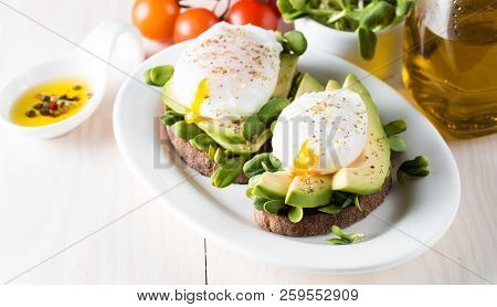 Avocado Toast, Cherry Tomato On Wooden Background. Breakfast With Toast Avocado, Vegetarian Food, He