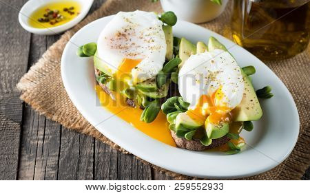 Avocado Toast, Cherry Tomato On Wooden Background. Breakfast With Toast Avocado, Vegetarian Food, He