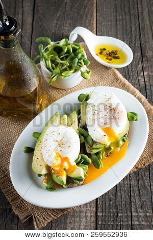 Avocado Toast, Cherry Tomato On Wooden Background. Breakfast With Toast Avocado, Vegetarian Food, He