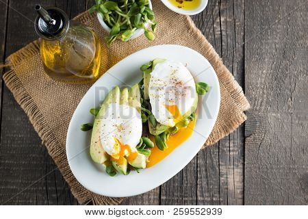 Avocado Toast, Cherry Tomato On Wooden Background. Breakfast With Toast Avocado, Vegetarian Food, He