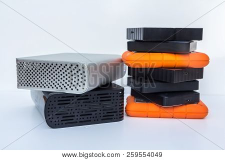 Different Kinds Of External Computer Storage Hard Drives - Isolated On White Background