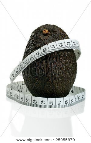 A Mexican Hass Avocado With A Metric Tape Measure, Concept For Healthy Eating