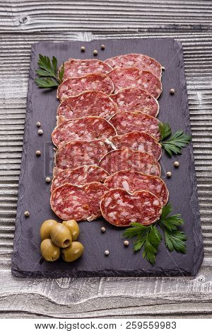 Saucisson Sec Delicious French Salami On A Wooden Background