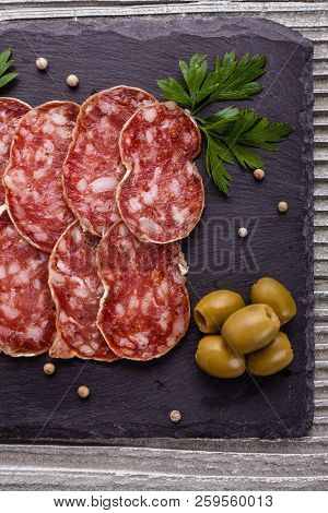 Saucisson Sec Delicious French Salami On A Wooden Background