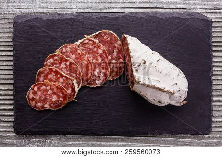 Saucisson Sec Delicious French Salami On A Wooden Background