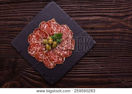 Saucisson Sec Delicious French Salami On A Wooden Background