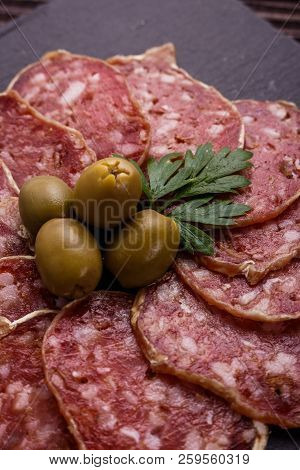 Saucisson Sec Delicious French Salami On A Wooden Background
